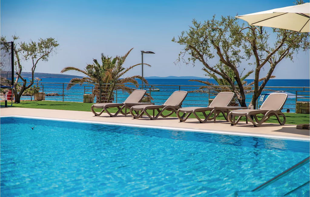 4 Personen Ferienwohnung mit Pool, 1000 m vom Strand